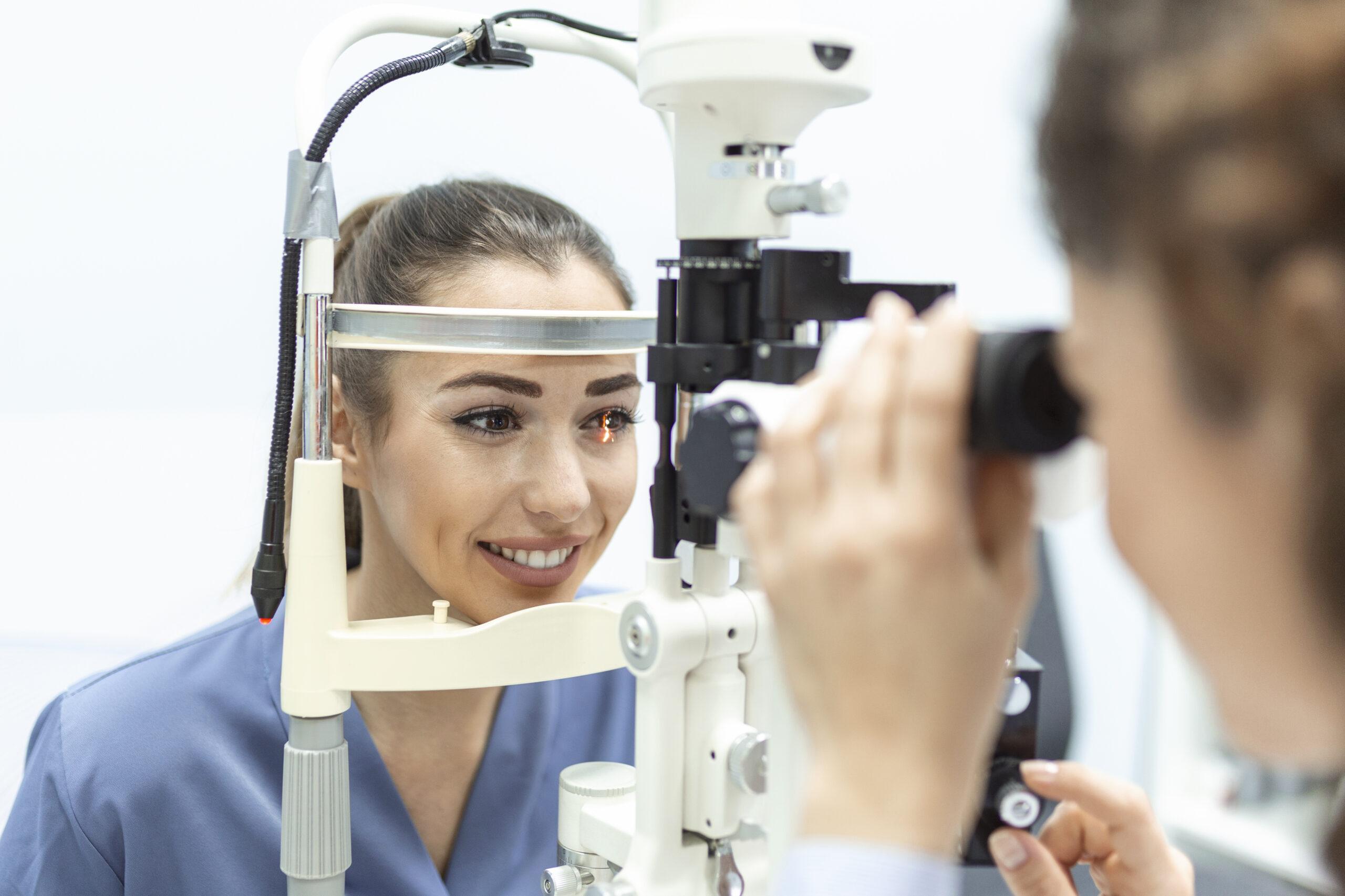 Dr. Ranjit Kharod conducting a comprehensive eye exam at 2020 Eyecare